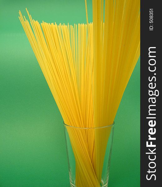 Pasta isolated on green background. Pasta isolated on green background.