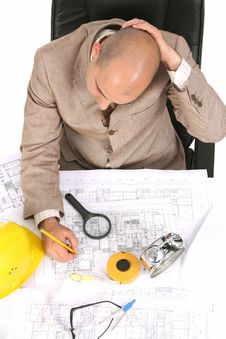 Businessman Thinking With Architectural Plans Stock Photography