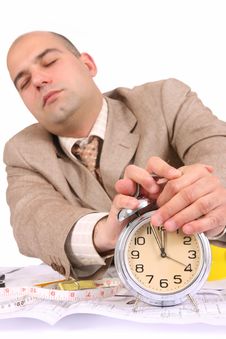 A Businessman Sleepy With Architectural Plans Royalty Free Stock Photography