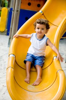 Child On Slide Royalty Free Stock Image Child On Slide Royalty Free Stock Image