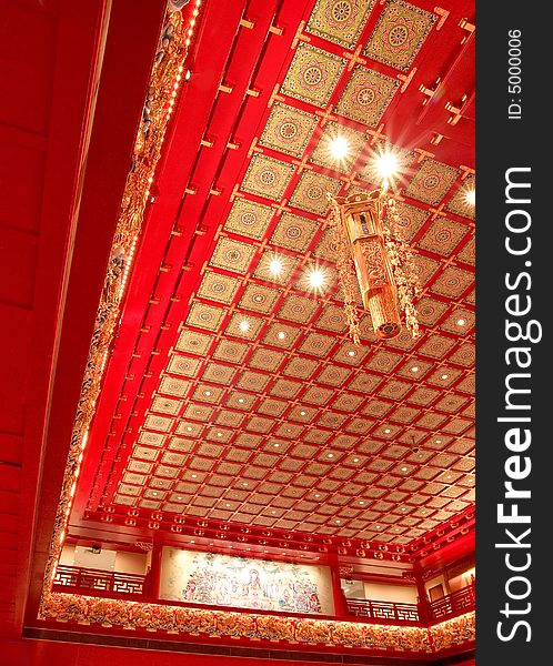 Indoor architecture of a chinese temple called the buddha tooth relic temple in singapore. Indoor architecture of a chinese temple called the buddha tooth relic temple in singapore.