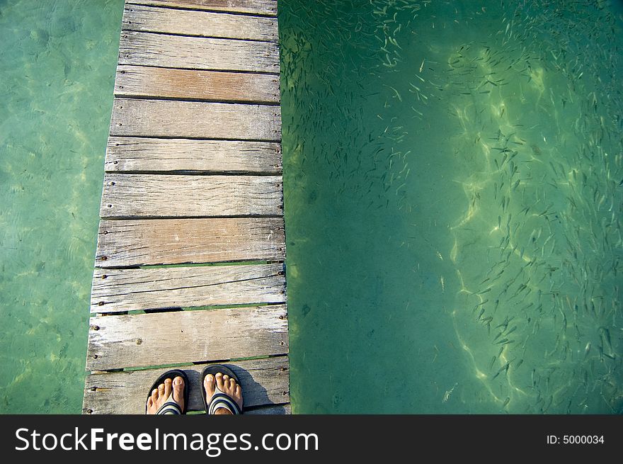 Man On Wooden Bridge