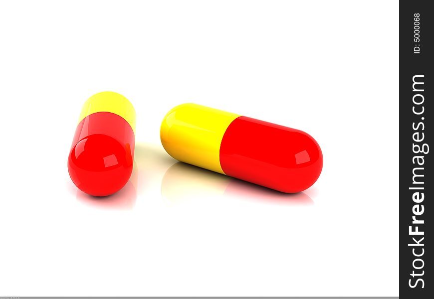 Two pieces of red and yellow capsules. Two pieces of red and yellow capsules