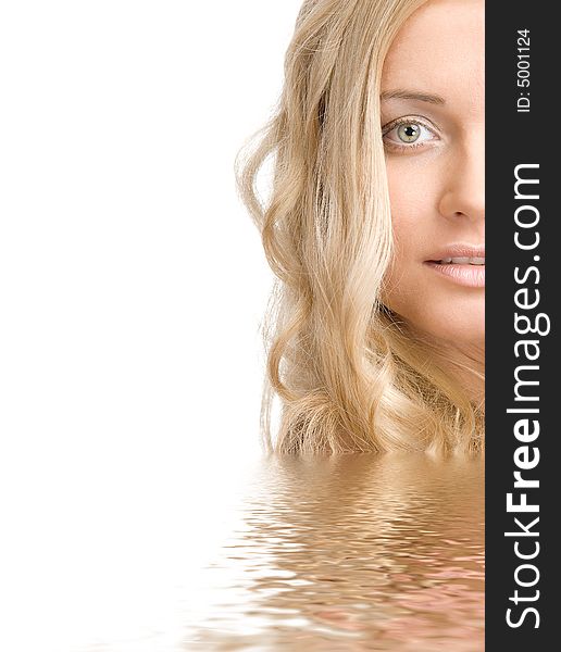 Portrait of a beautiful blond lady in water on a white background. Portrait of a beautiful blond lady in water on a white background