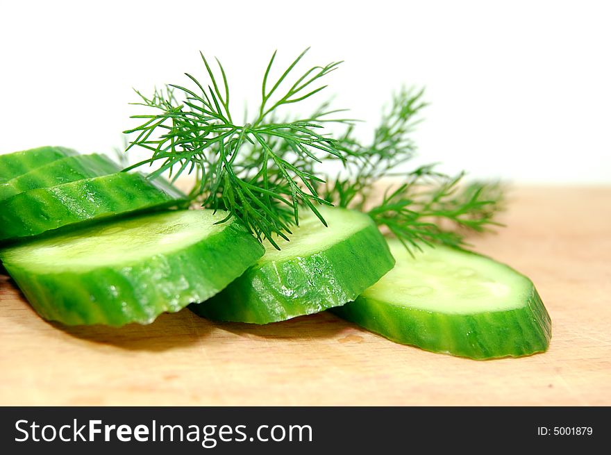 Sliced cucumber with fennel isolated