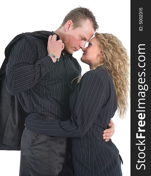 Young couple in black dress on white background