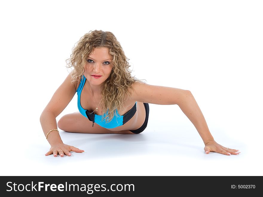 Girl practicing fitness  on  white  background