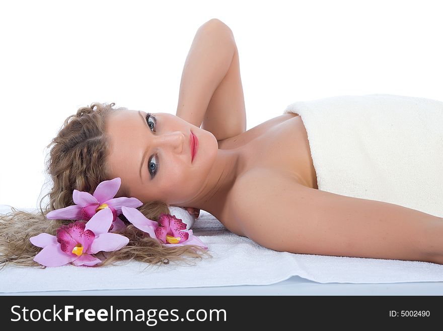 Attractive woman getting spa treatment on white