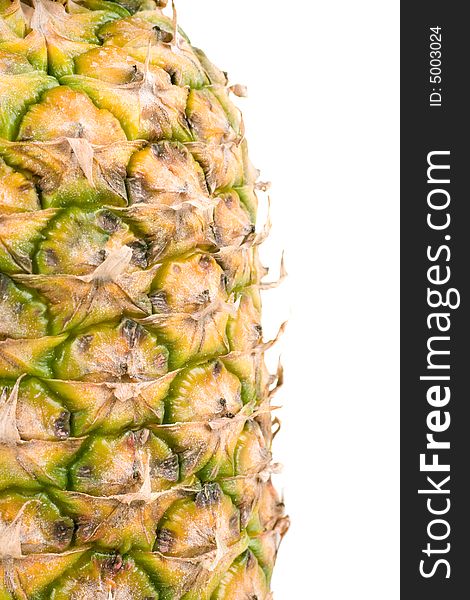 A vertical closeup of the texture of a fresh pineapple. A vertical closeup of the texture of a fresh pineapple