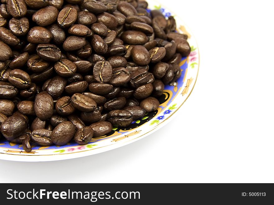 Coffe beans with plate isolated on white background