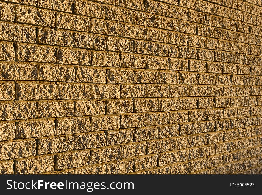 The patterns created by the bricks in a facebrick wall. The patterns created by the bricks in a facebrick wall