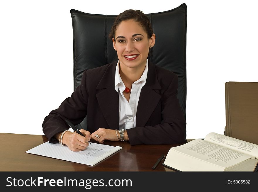 Pretty brunette business woman at her desk doing research. Isolated against white. Pretty brunette business woman at her desk doing research. Isolated against white.