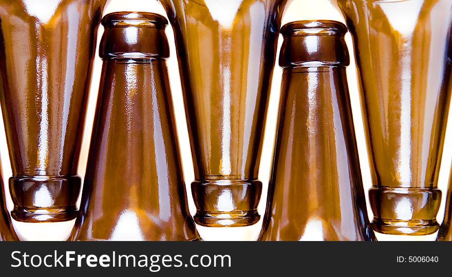 Close-up of beer bottles isolated on white background