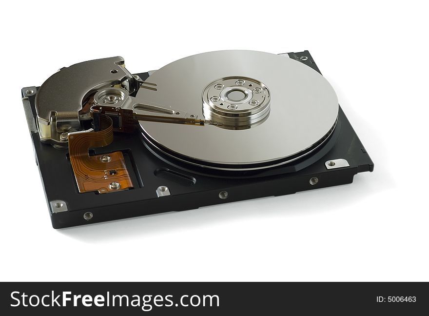 Disassembled hard disc isolated on white. Disassembled hard disc isolated on white