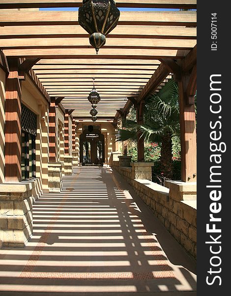 Wood Corridor With Arabian Bronze Lamp