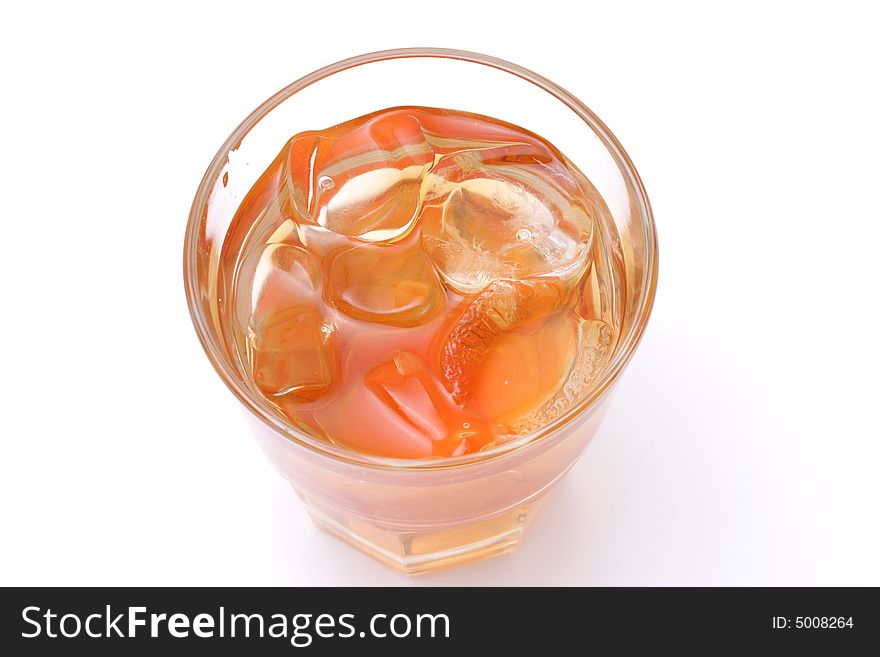 Whiskey in a glass. Isolated on a white background