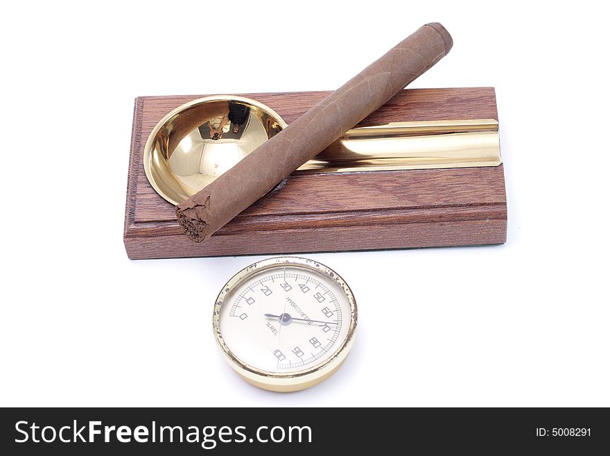 Cigar and ashtray isolated on a white background