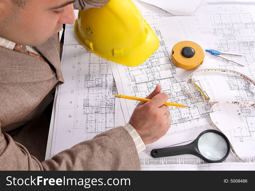Businessman with architectural plans