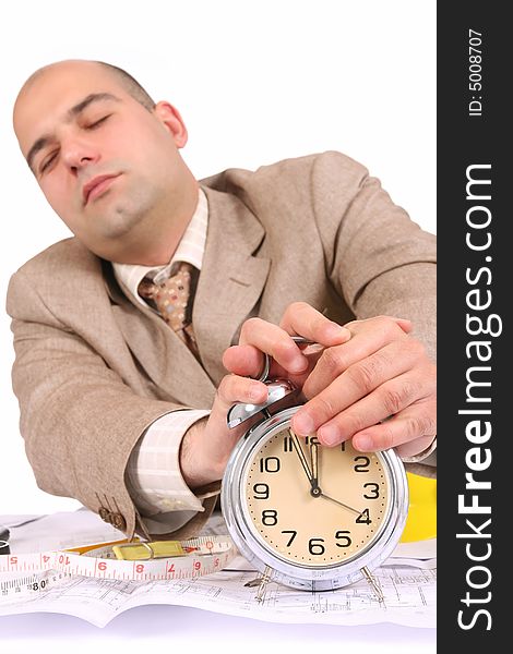 A Businessman Sleepy With Architectural Plans