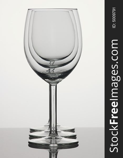 Three wineglasses on white background. Three wineglasses on white background