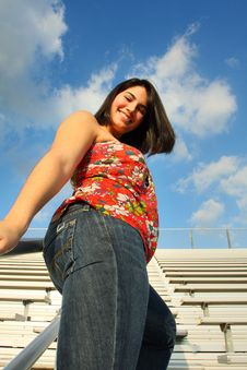 Woman By The Bleachers Stock Photo Woman By The Bleachers Stock Photo