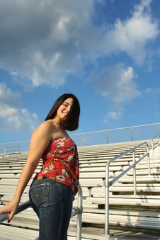 Woman On Bleachers Royalty Free Stock Photo Woman On Bleachers Royalty Free Stock Photo