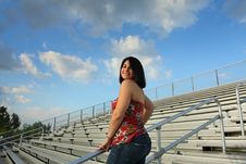 Woman On Bleachers Royalty Free Stock Photos Woman On Bleachers Royalty Free Stock Photos
