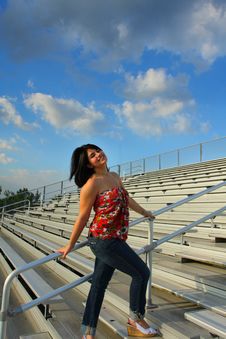 Woman On Bleachers Royalty Free Stock Photo Woman On Bleachers Royalty Free Stock Photo