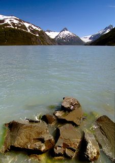Rocks, Lake And Portage Glacier Royalty Free Stock Photo