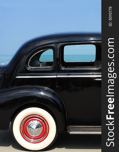 Classic car and view of ocean. Classic car and view of ocean
