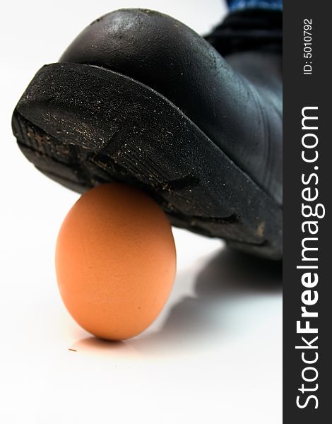 Black chooseï¿½ crushing an egg. Black chooseï¿½ crushing an egg