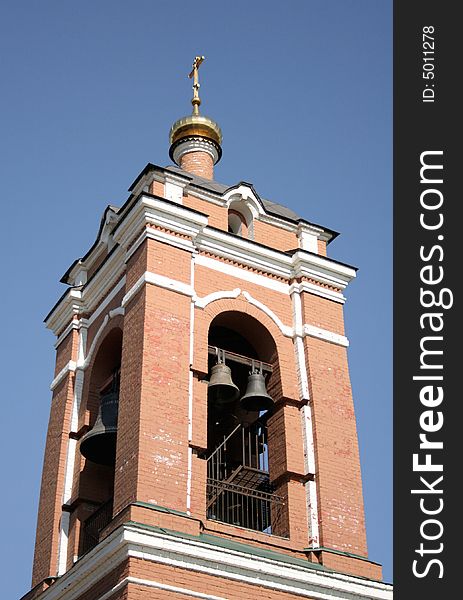 View of a bell-tower on an Easter Sunday. View of a bell-tower on an Easter Sunday.