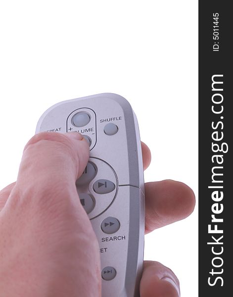 Hand holding music remote control. Hand holding music remote control