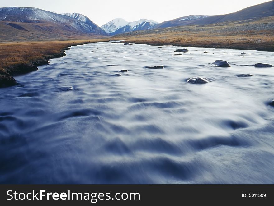 The mountain river with clean water. Photo. The mountain river with clean water. Photo.