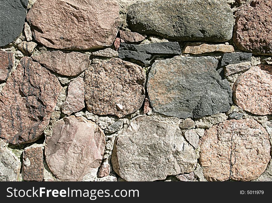 Old stone wall,focus on a center