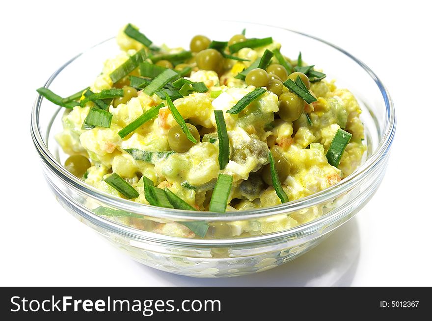 Salad from vegetables isolated on a white background