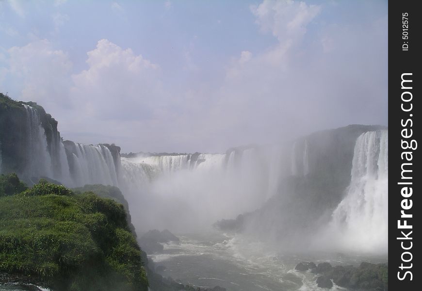 Iguazu waterfalls located on the boarders of Argentina, Brazil and Paraguay. Iguazu waterfalls located on the boarders of Argentina, Brazil and Paraguay