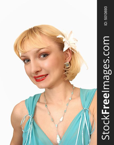 An friendly blond girl in an a studio
with a beige flower in her hair for white background. An friendly blond girl in an a studio
with a beige flower in her hair for white background.