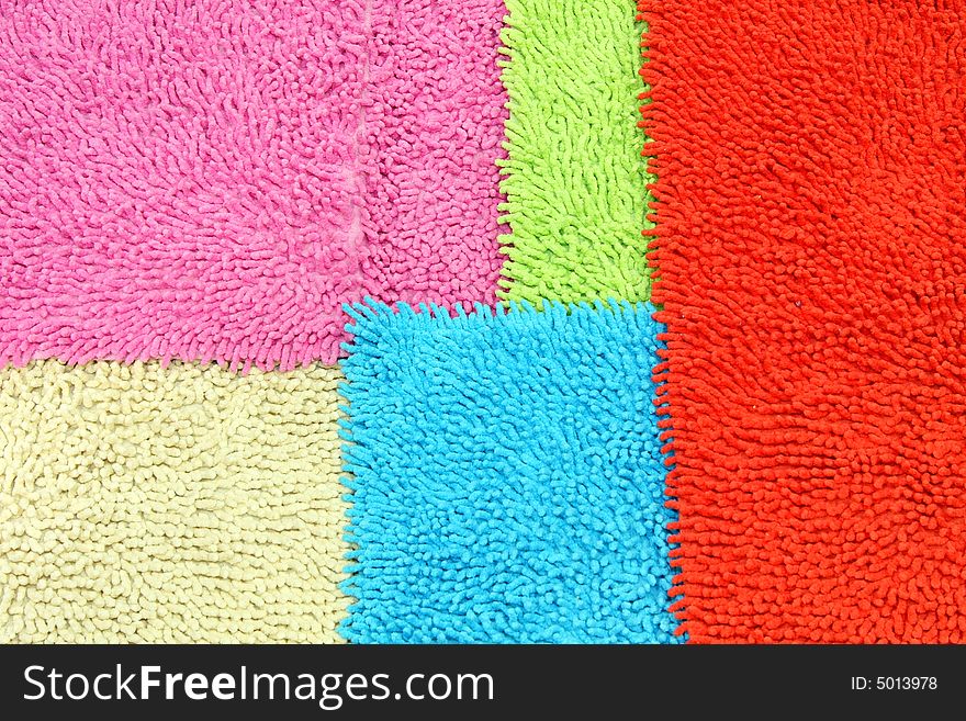 Bunch of doormats in several different colors