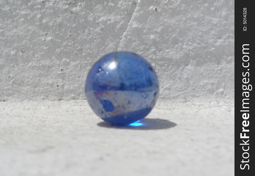 Photo of a blue glass ball. Photo of a blue glass ball