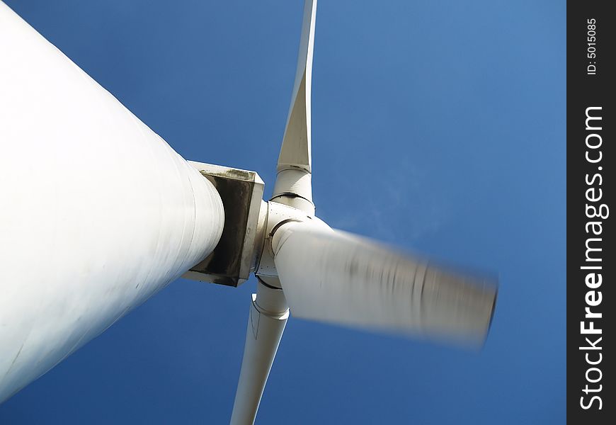 Photo of electricity wind turbines producing eco friendly energy