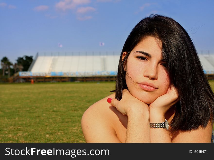 Woman on a sports field. Woman on a sports field.