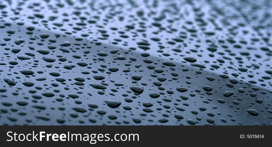 Drops of water at smooth shiny surface. Drops of water at smooth shiny surface
