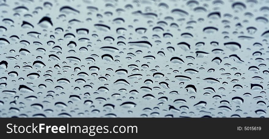 Water drops at glass after rain