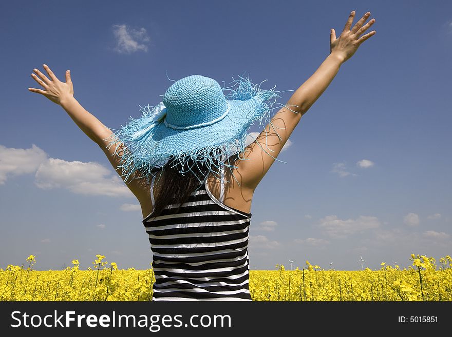 Teenagers in the field stretched hands in the air. Teenagers in the field stretched hands in the air