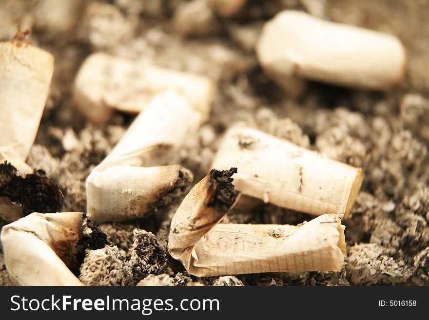 Close up of cigarettes in an ashtray (low DOF)