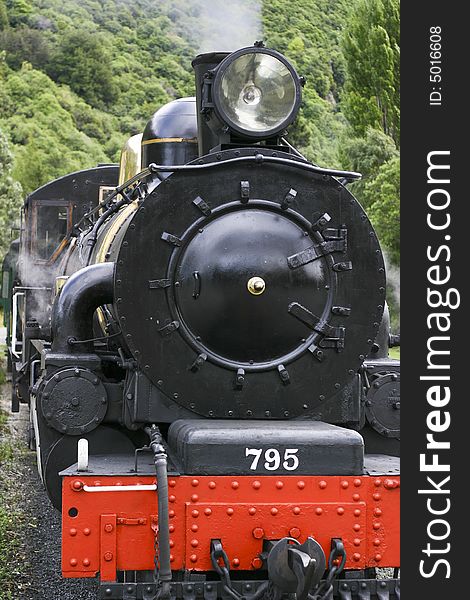 A steam locomotive ready to leave the station - The Kingston Flyer, Queenstown, New Zealand. A steam locomotive ready to leave the station - The Kingston Flyer, Queenstown, New Zealand