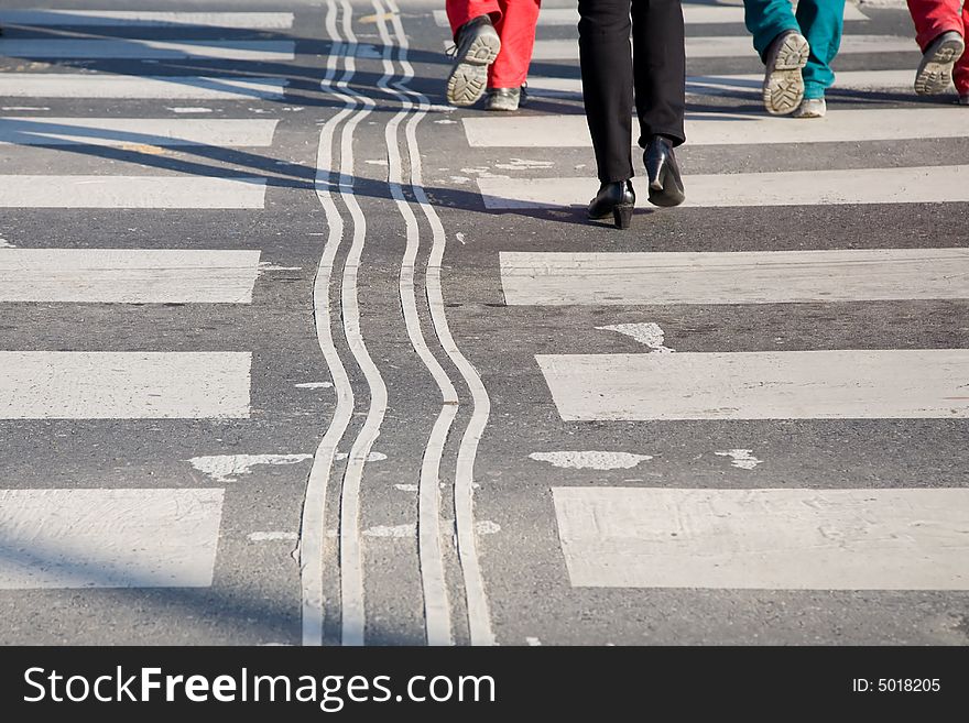 Business woman and workers on the crosswalk with curved guiding line.