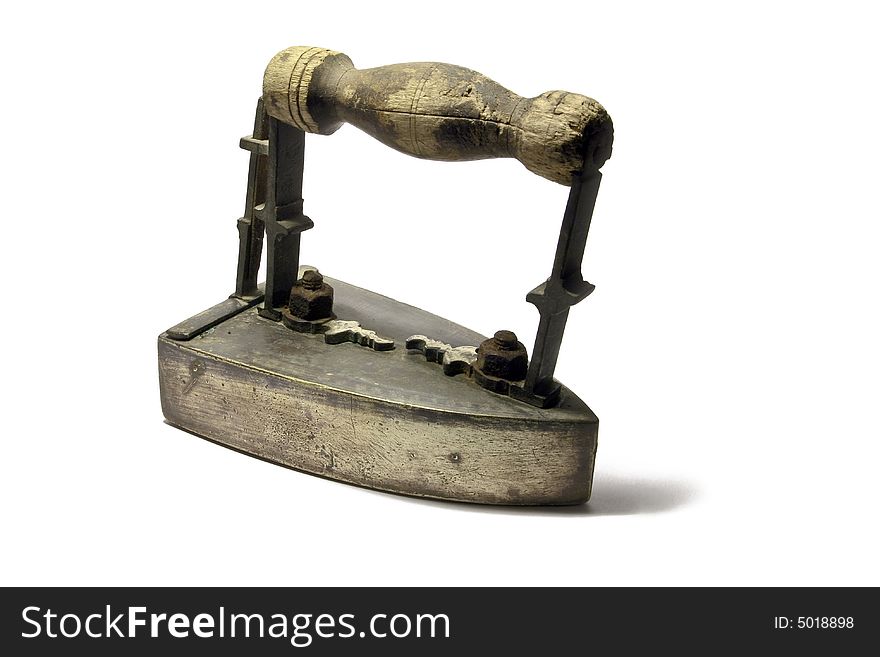 Antique coil powered iron in white background. Antique coil powered iron in white background