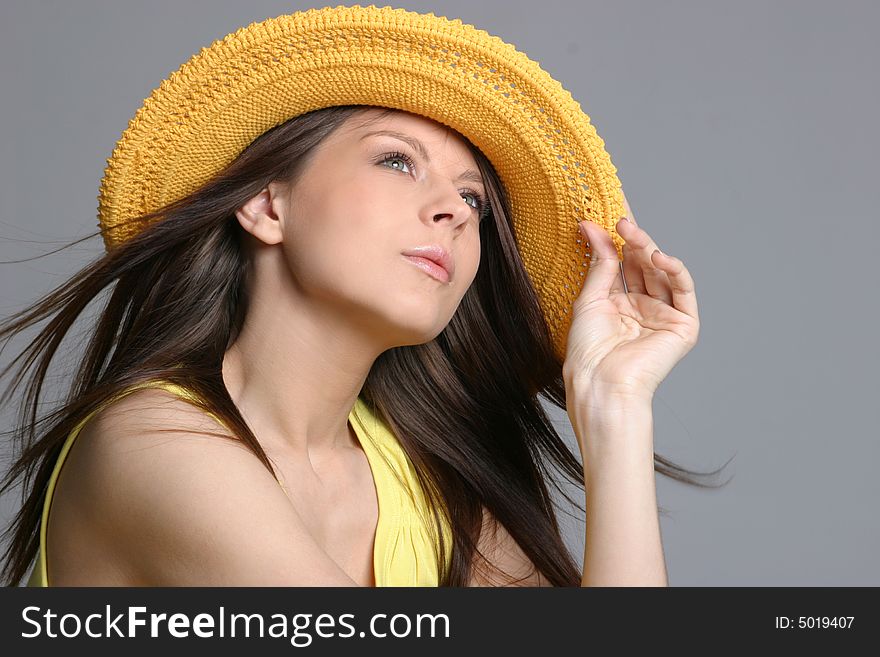 Beautiful Sexy Woman In Yellow Hat